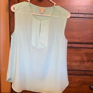 J.Crew sleeveless top with front detailing.